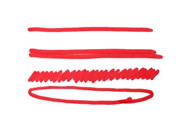 Photo of Different stripes and ellipse drawn with red marker isolated on white, top view