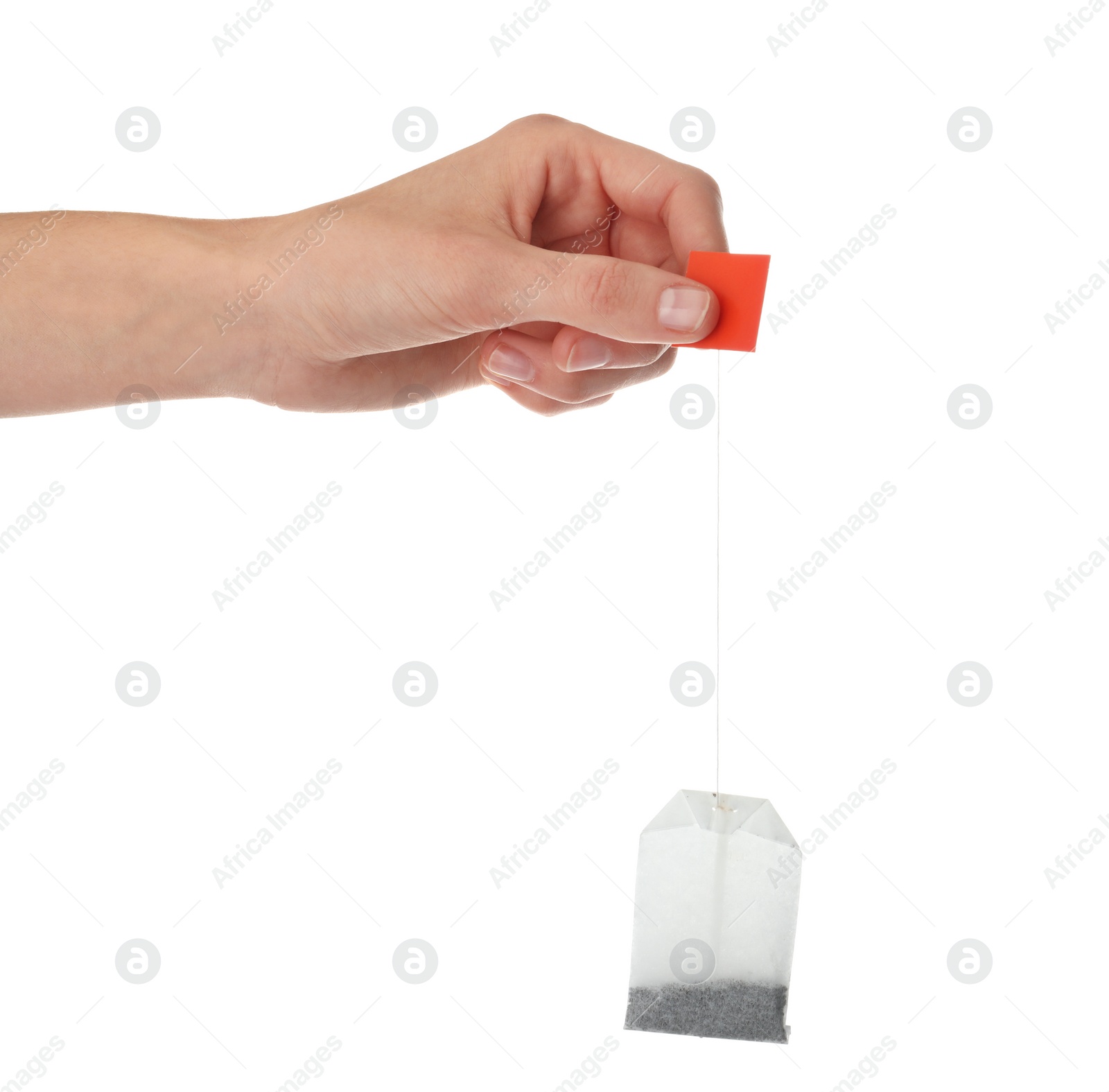 Photo of Woman holding tea bag on white background