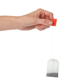 Photo of Woman holding tea bag on white background