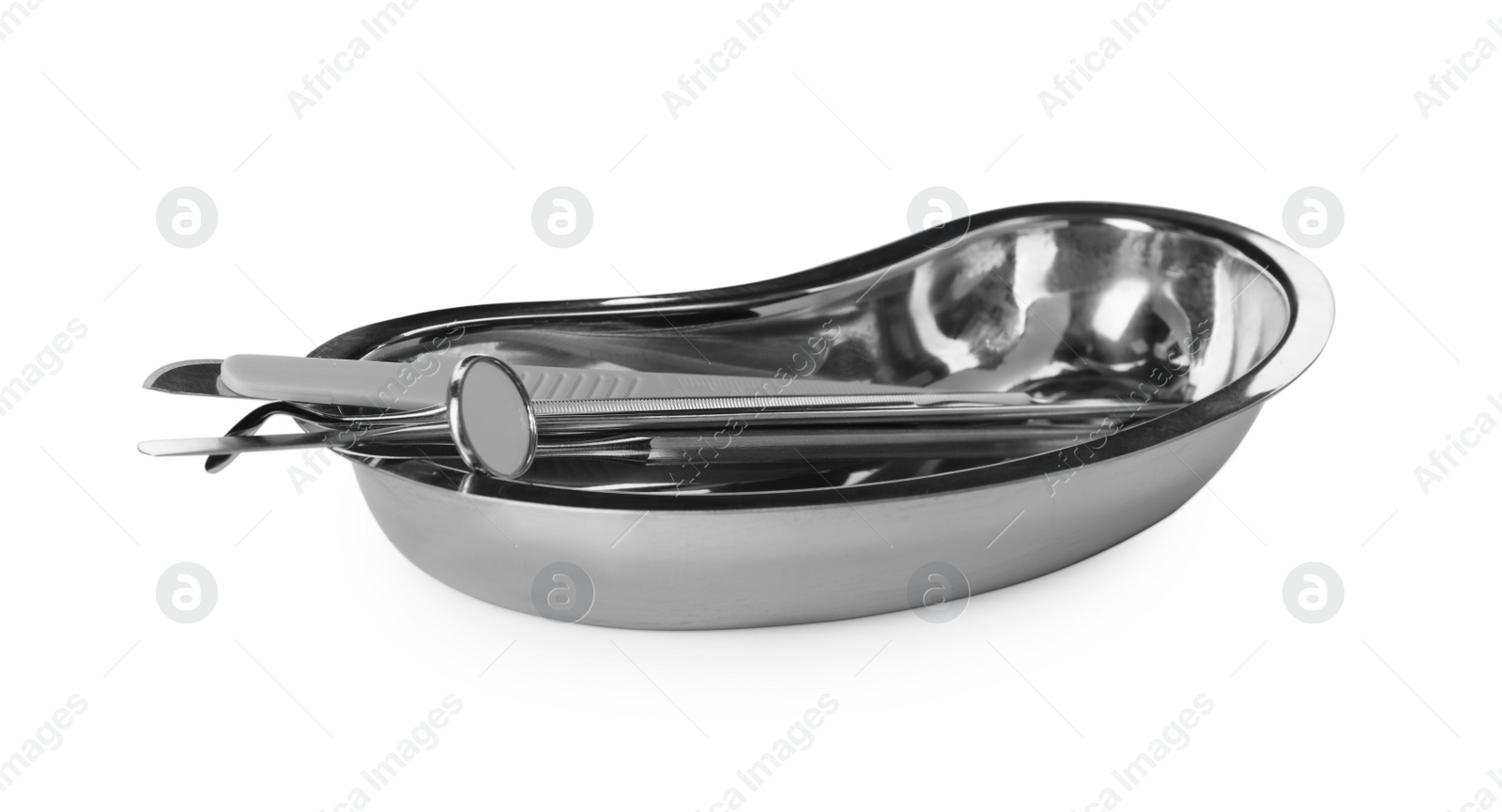 Photo of Kidney shaped tray with set of dentist's tools isolated on white