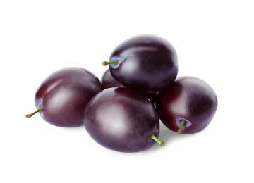 Delicious fresh ripe plums on white background