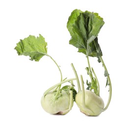 Photo of Whole ripe kohlrabies with leaves on white background