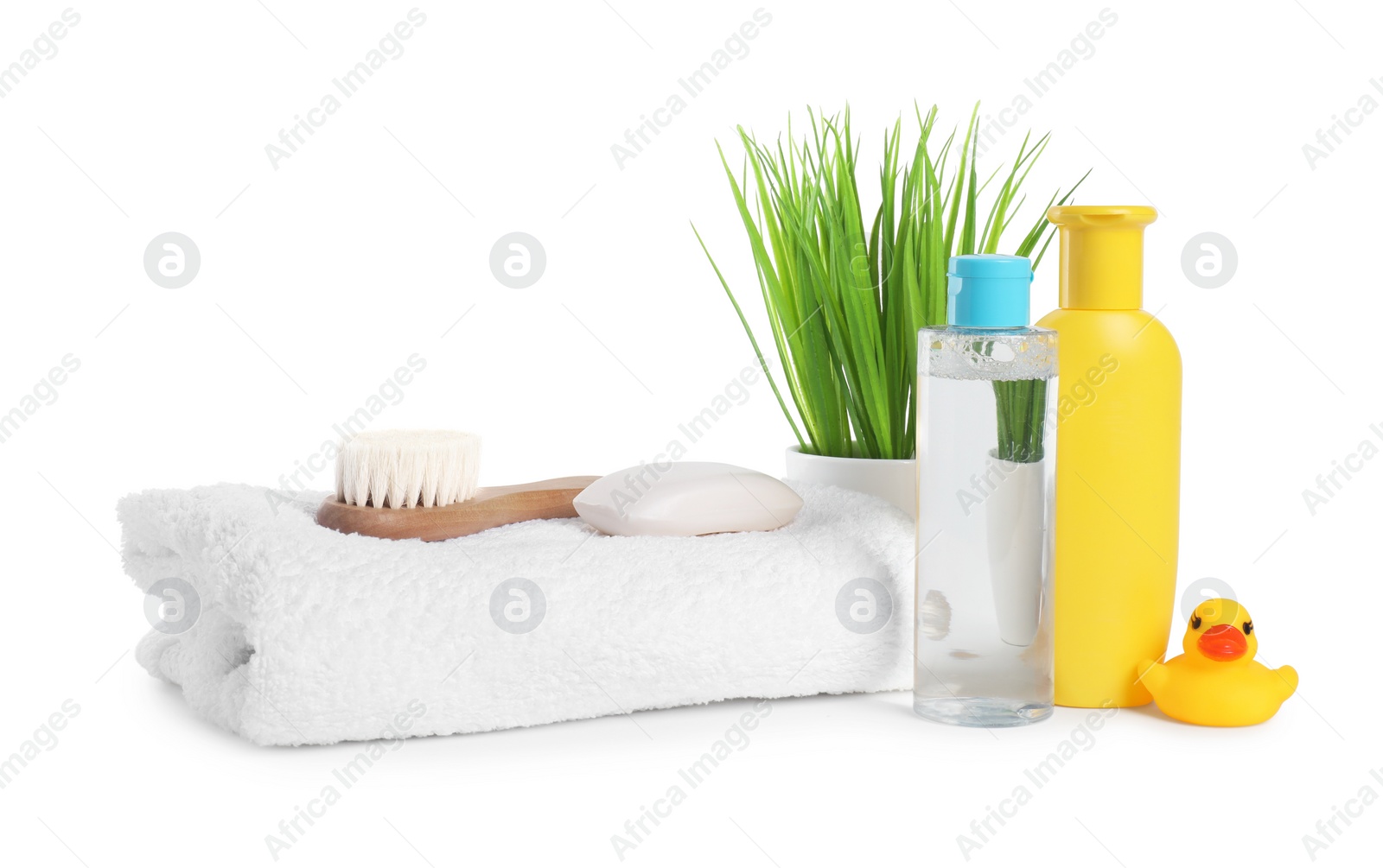 Photo of Baby cosmetic products, bath duck, brush and towel isolated on white