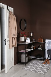 Hallway interior with console table and stylish decor