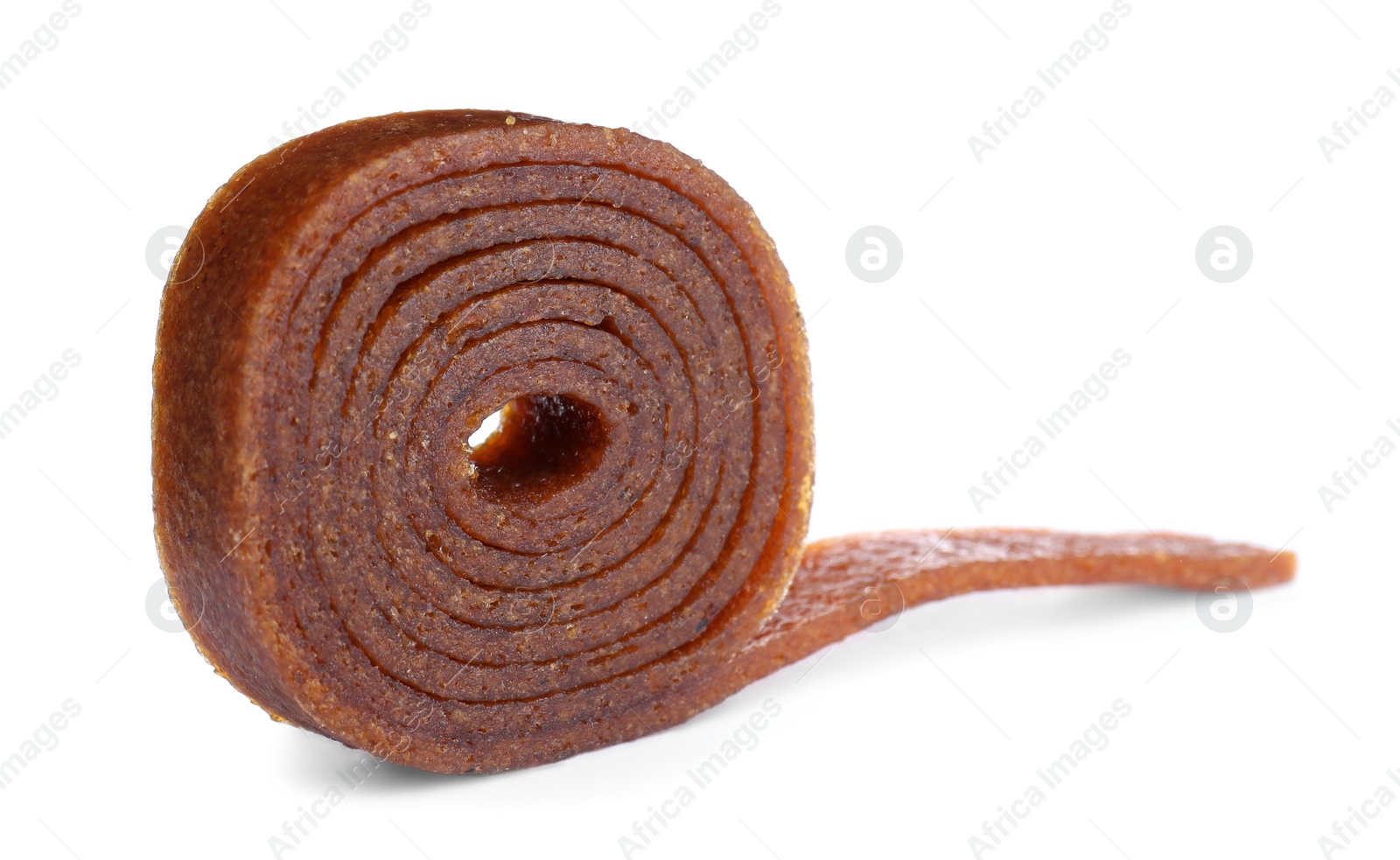 Photo of Delicious fruit leather roll isolated on white