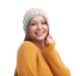 Young woman in warm sweater and hat on white background. Winter season