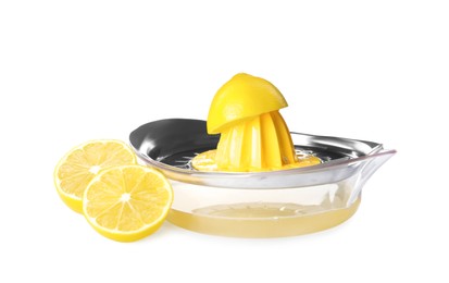 Photo of Squeezer with juice and lemons on white background