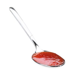 Photo of Spicy chili sauce in spoon isolated on white