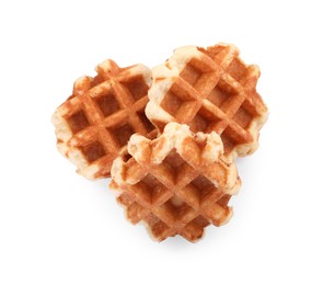 Many delicious Belgian waffles isolated on white, top view