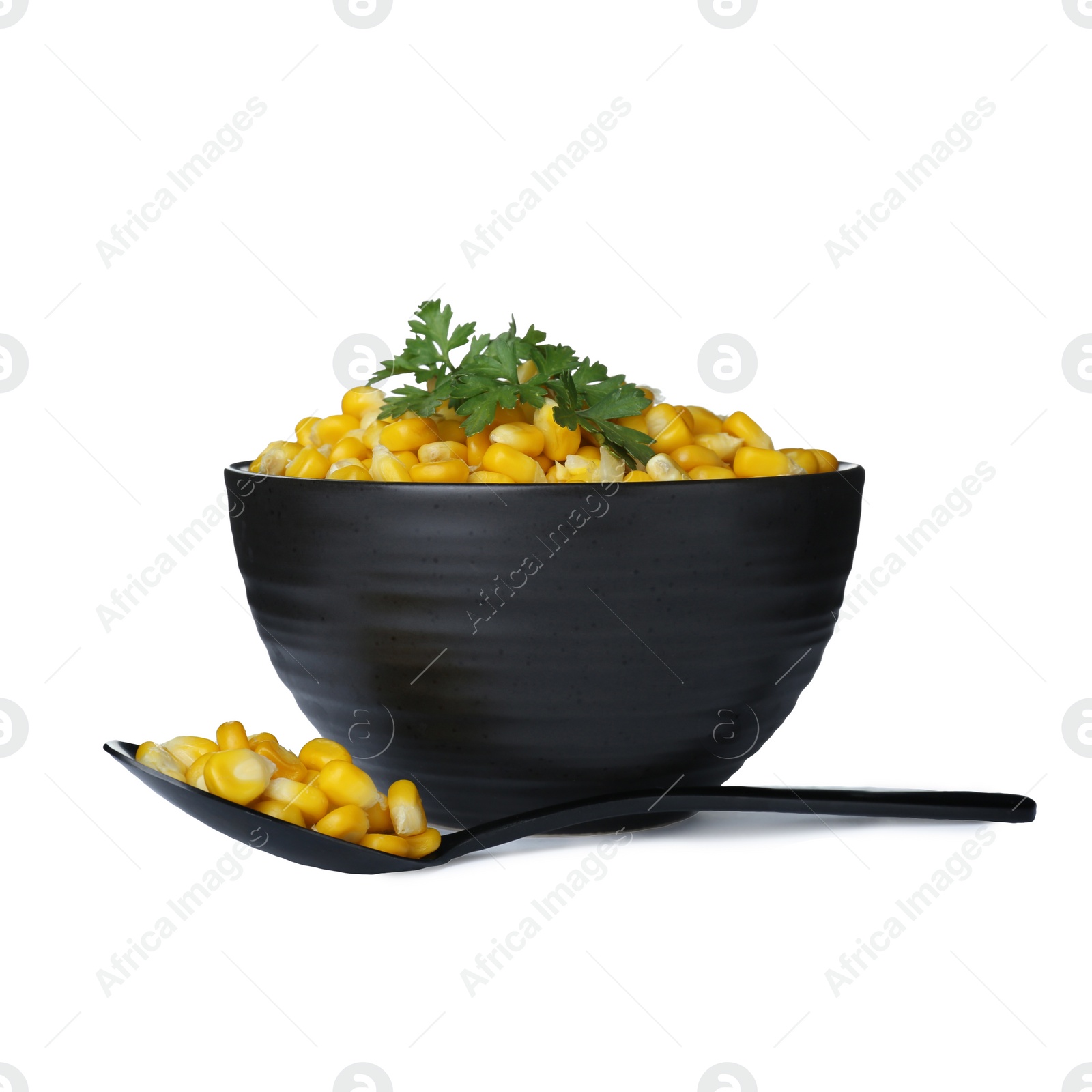 Photo of Bowl and spoon with tasty boiled corn on white background