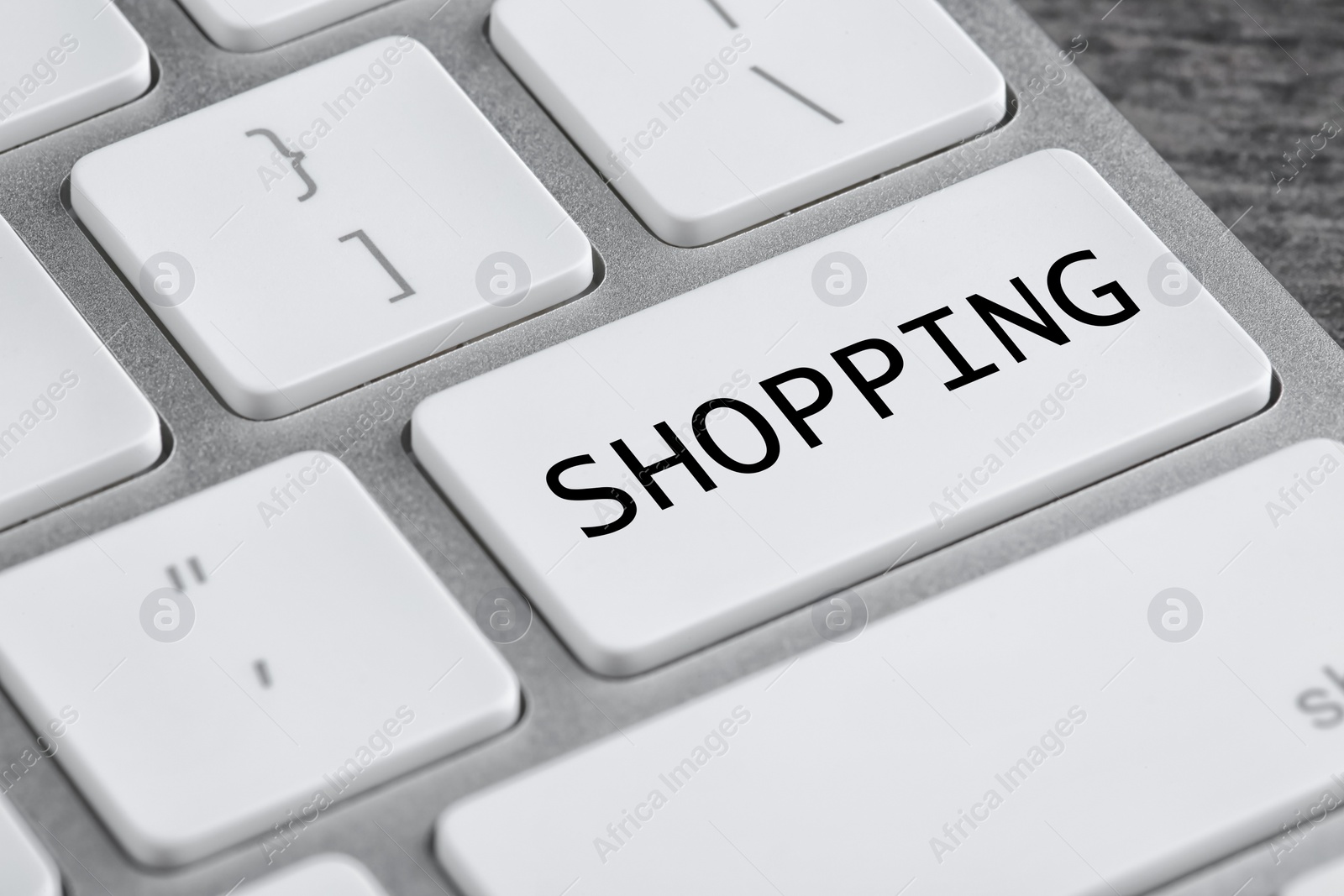 Image of Online store. Button with word SHOPPING on computer keyboard, closeup