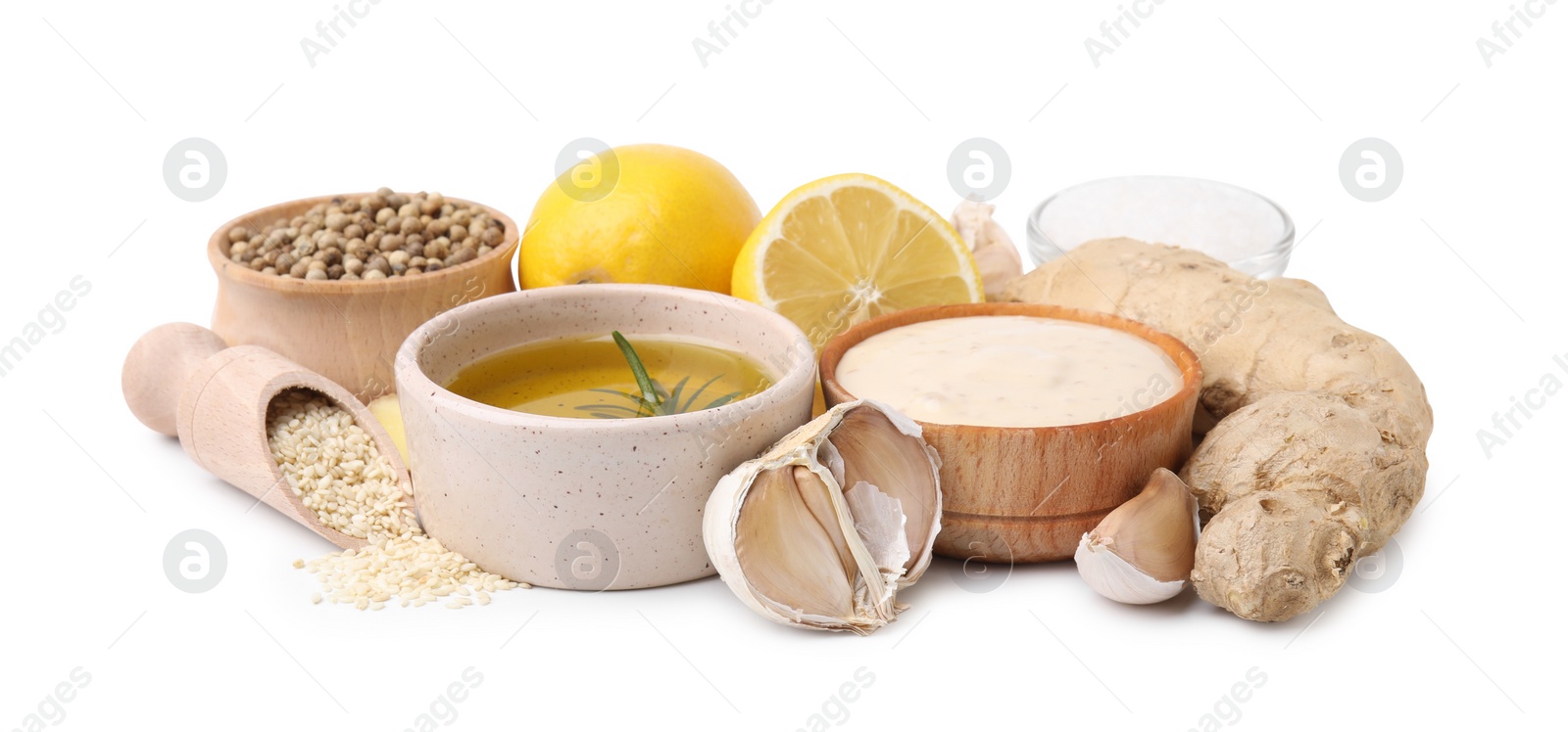Photo of Fresh marinade and different ingredients on white background