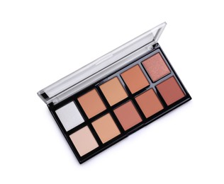 Photo of Colorful contouring palette on white background, top view. Professional cosmetic product