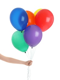 Photo of Woman holding bunch of colorful balloons on white background