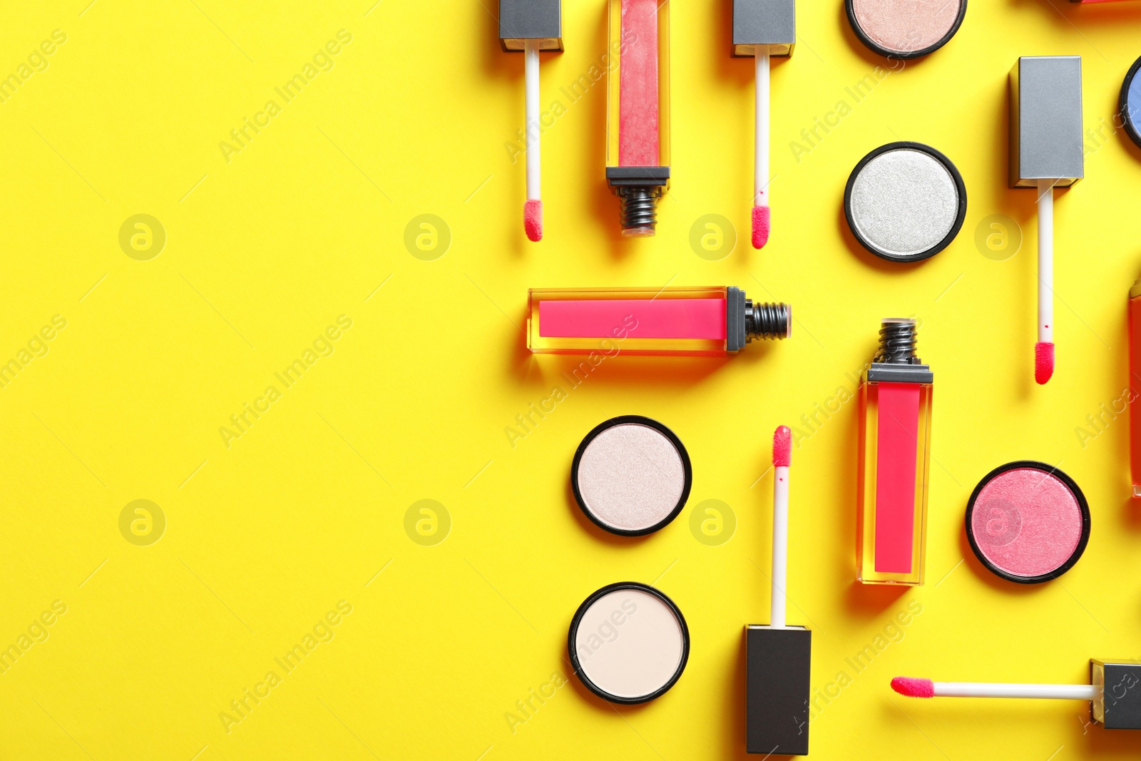 Photo of Composition with lipsticks on color background, flat lay. Space for text