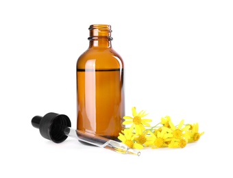 Photo of Bottle of herbal essential oil, pipette and flowers isolated on white