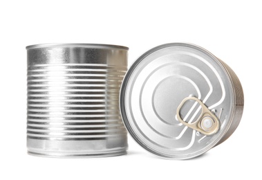 Photo of Closed tin cans isolated on white, mockup for design