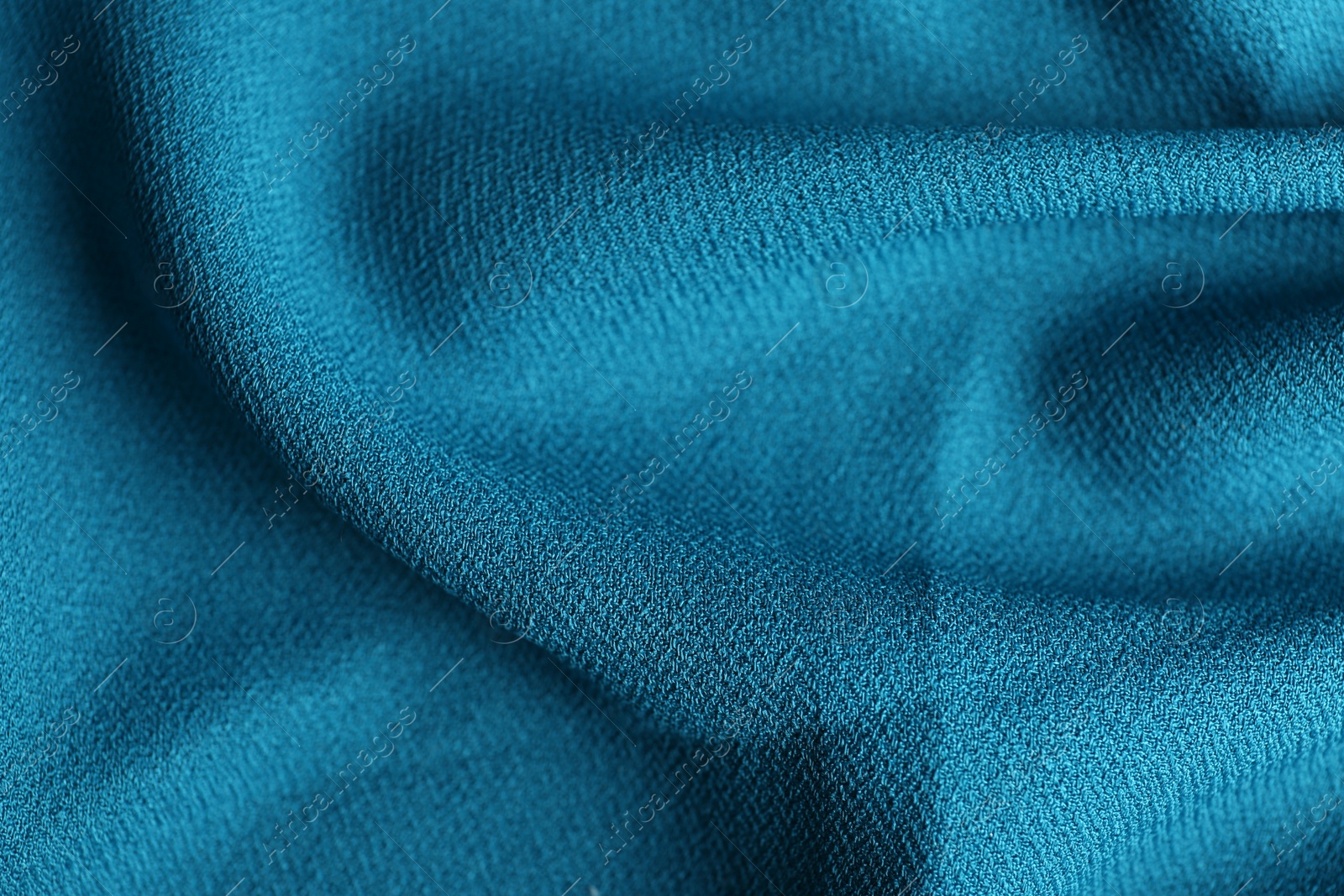 Photo of Texture of beautiful blue fabric as background, closeup