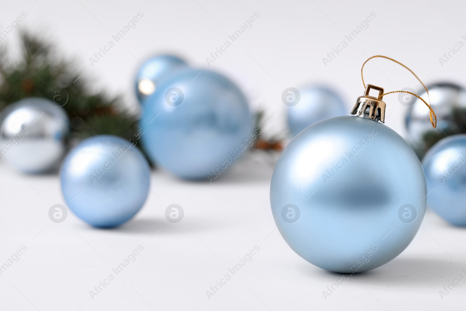 Photo of Beautiful Christmas ball on blurred background. Space for text