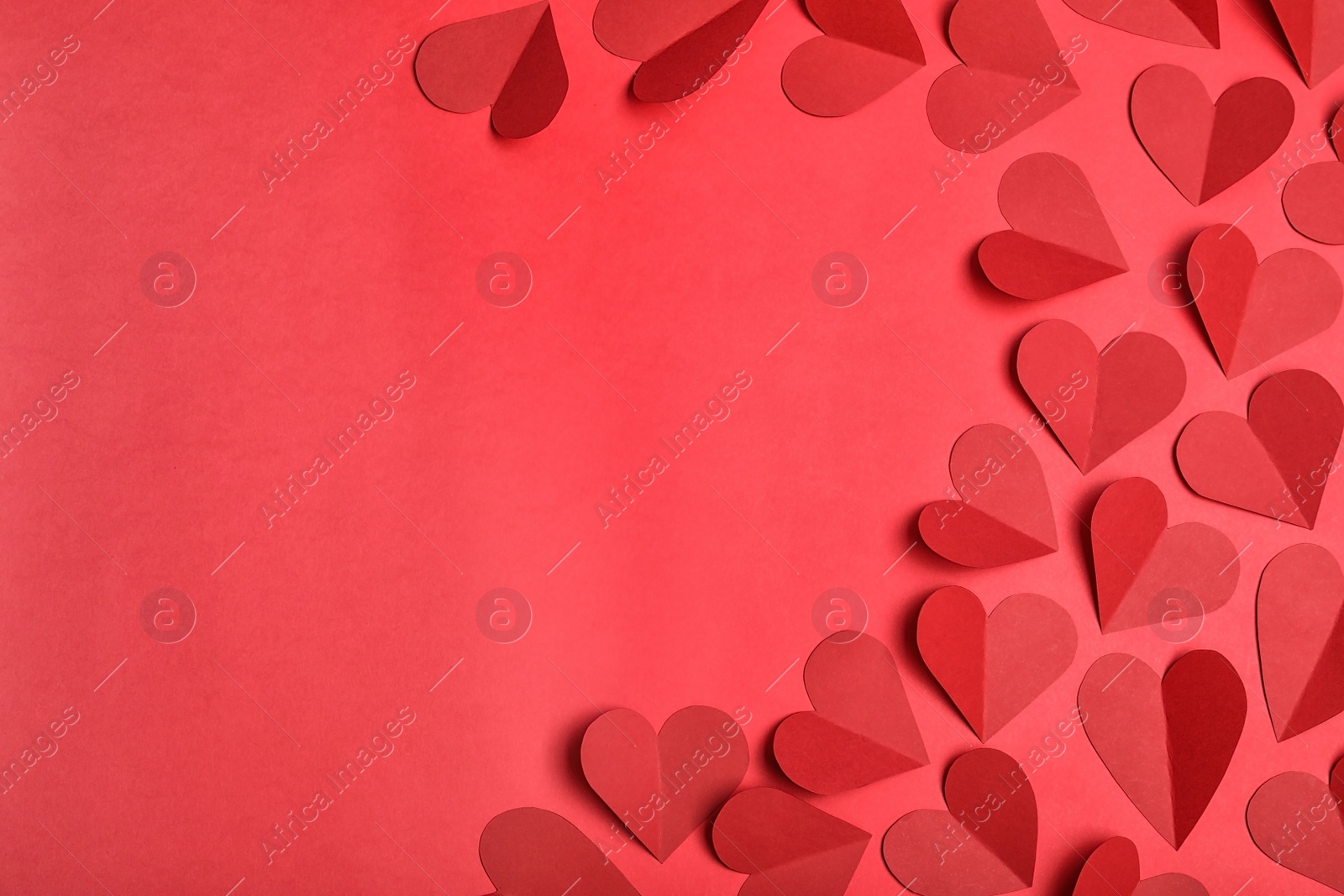 Photo of Flat lay composition with paper hearts and space for text on color background