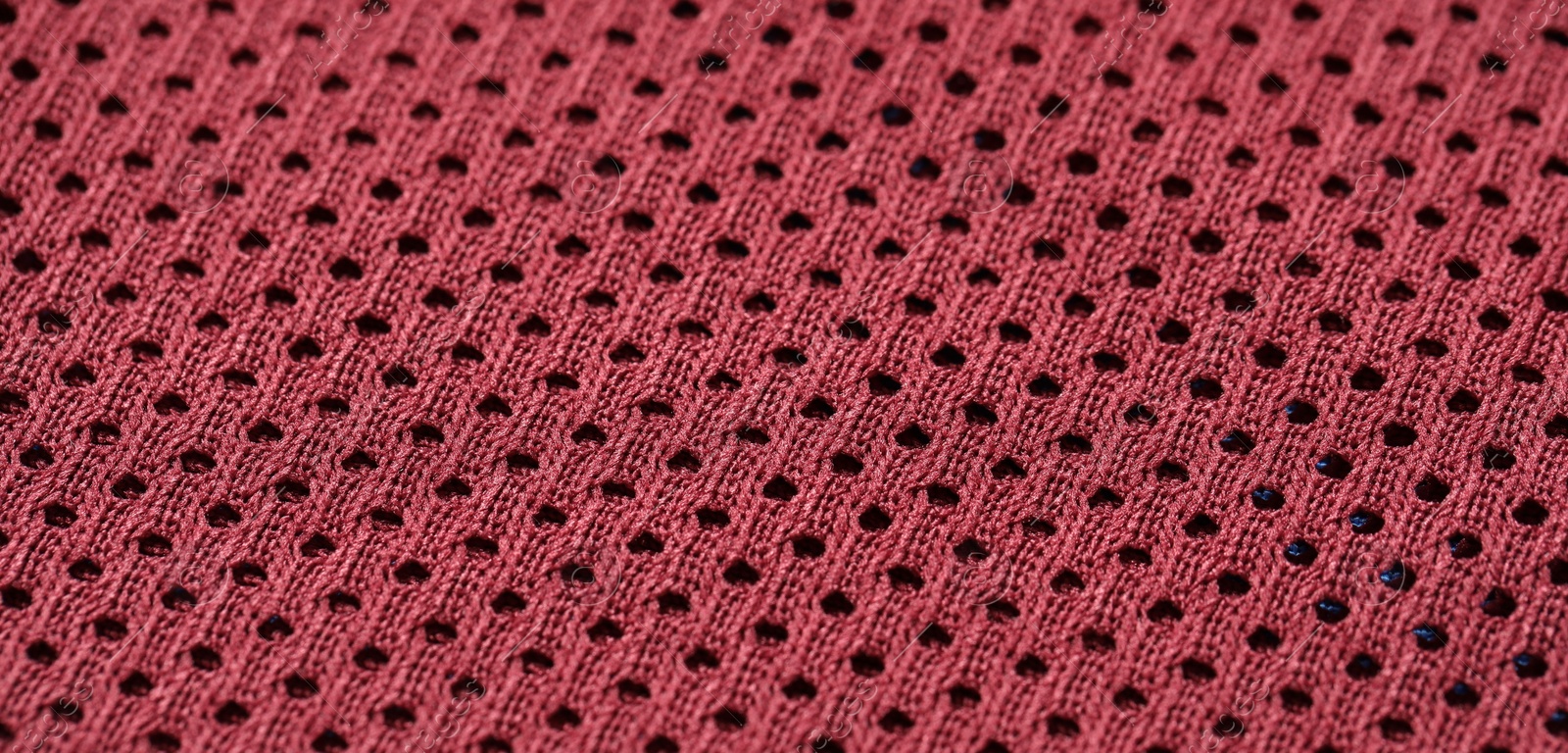 Photo of Texture of burgundy fabric as background, closeup