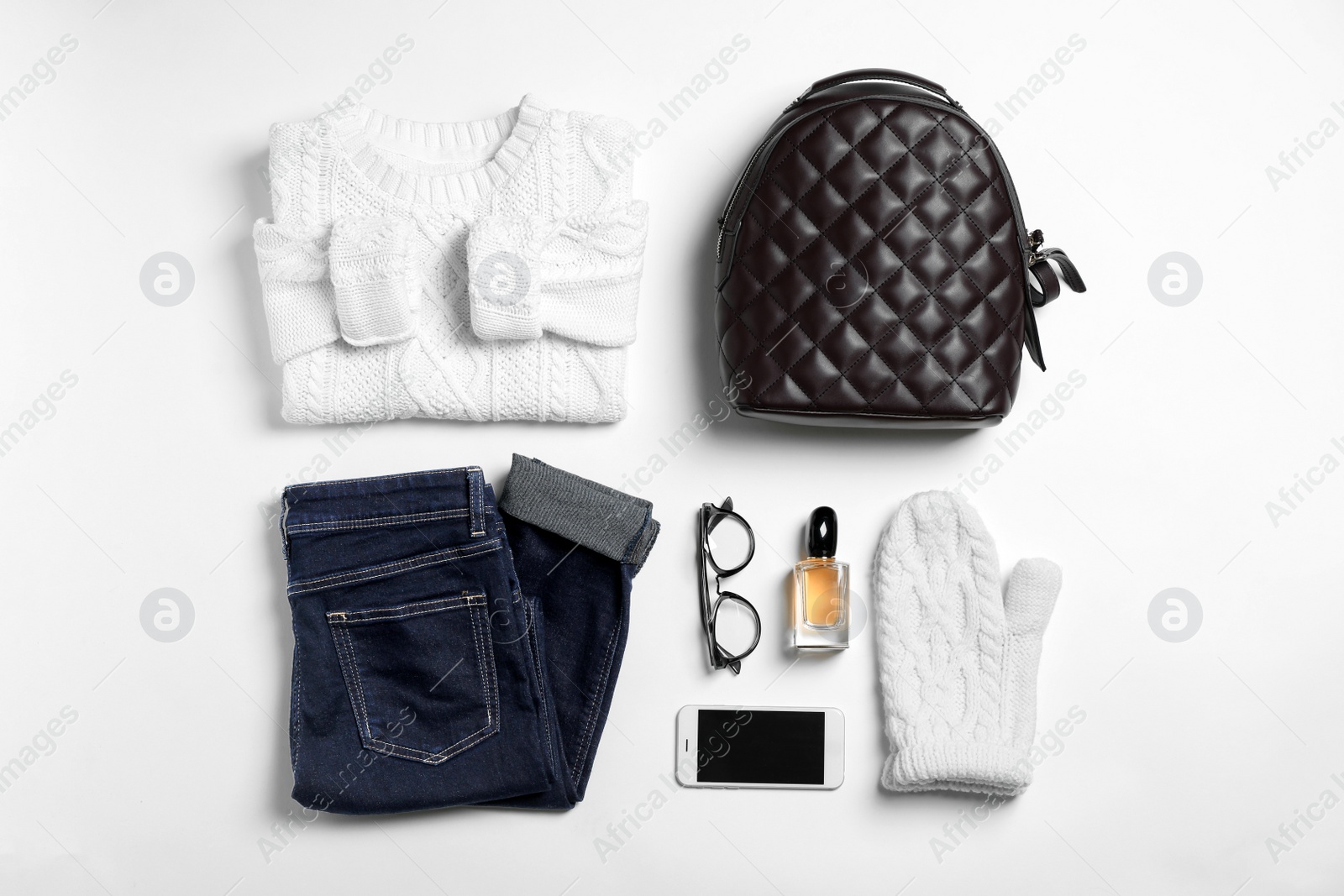 Photo of Set of stylish clothes and accessories on white background, flat lay