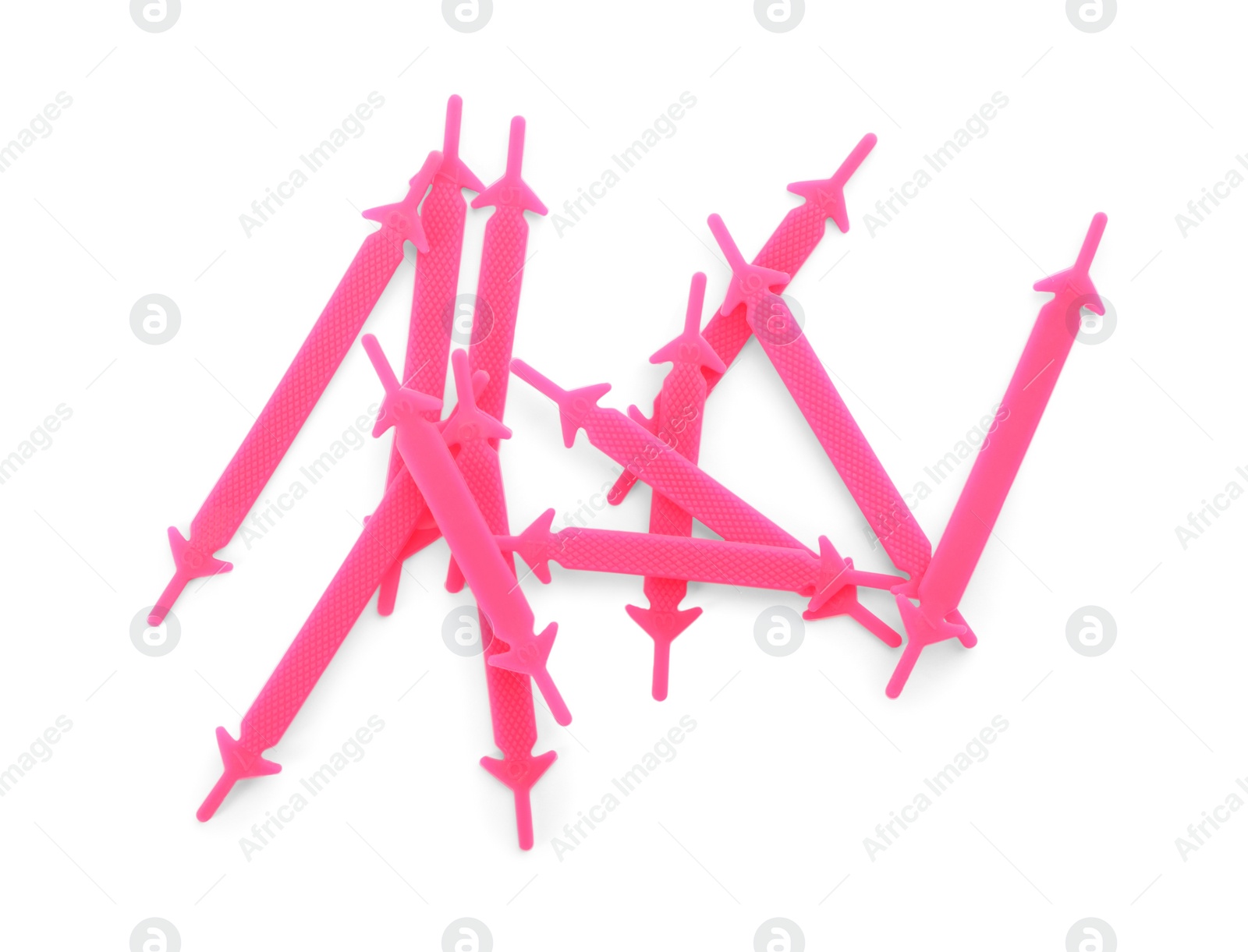 Photo of Pink silicone shoe laces on white background, top view