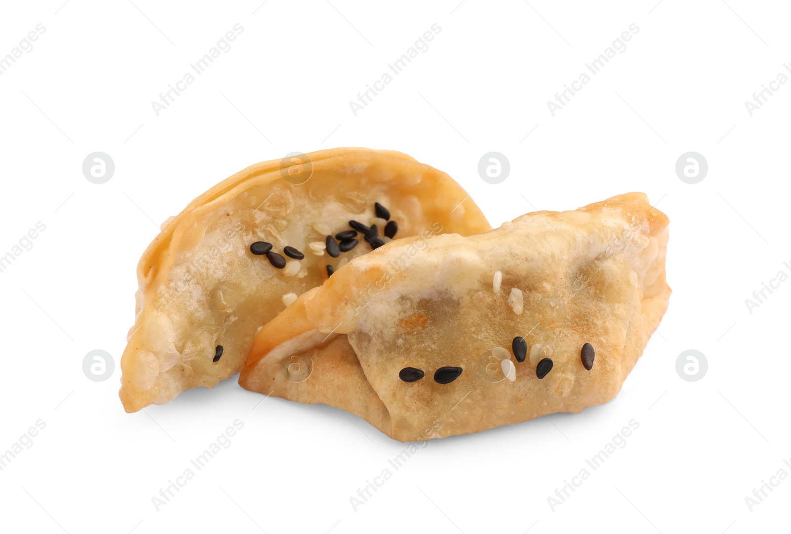 Photo of Delicious gyoza (asian dumplings) with sesame isolated on white