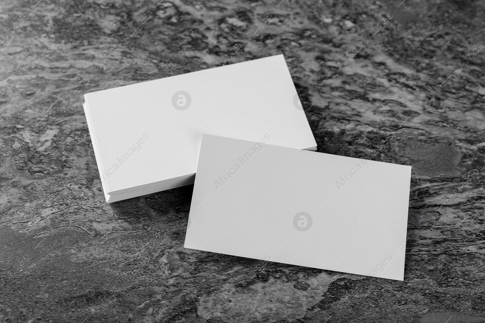 Photo of Blank business cards on grey background. Mockup for design