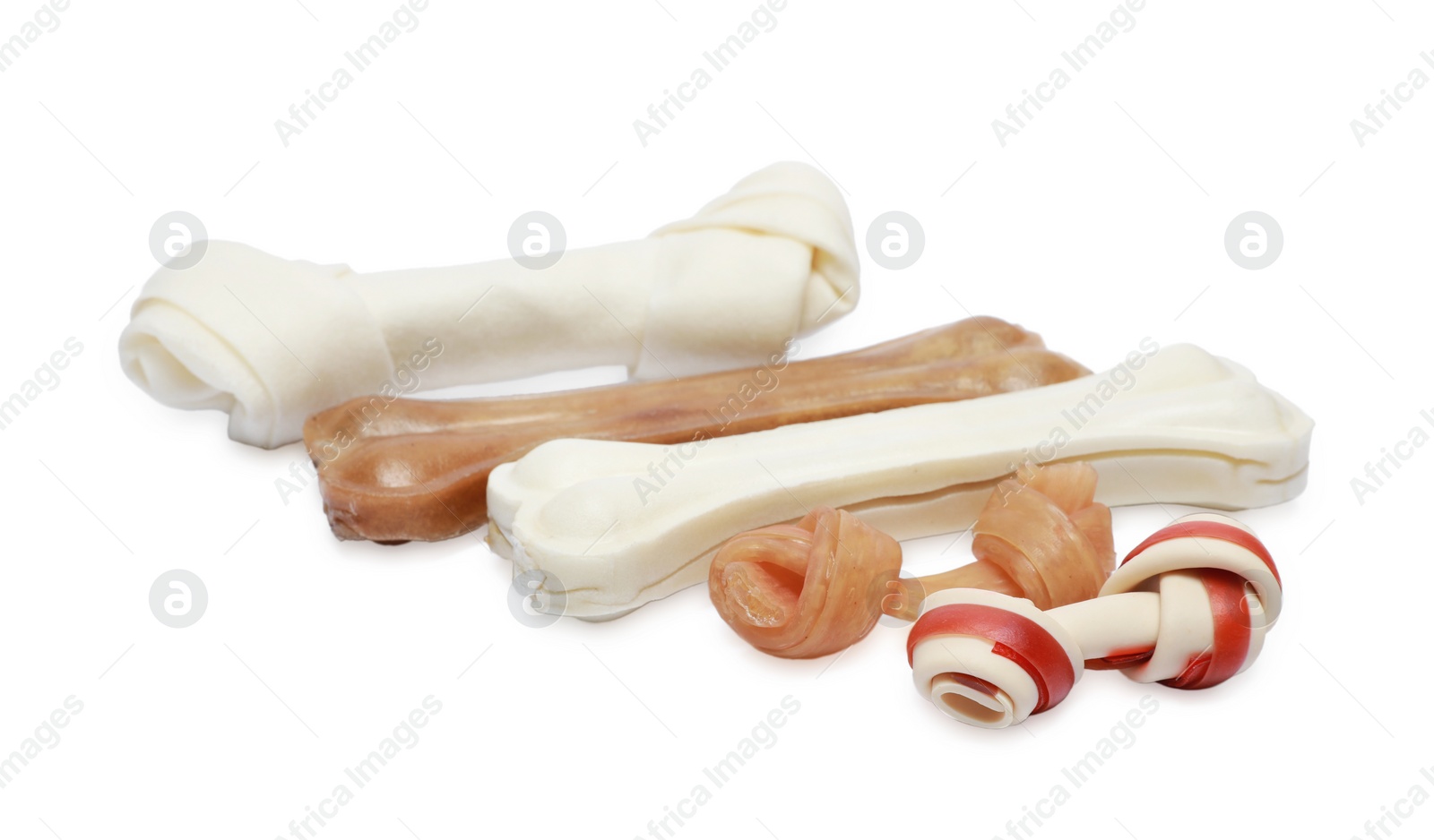 Photo of Different bone dog treats isolated on white