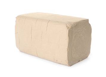 Block of compressed yeast on white background