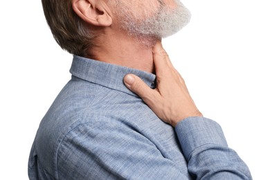 Photo of Senior man suffering from sore throat on white background, closeup. Cold symptoms