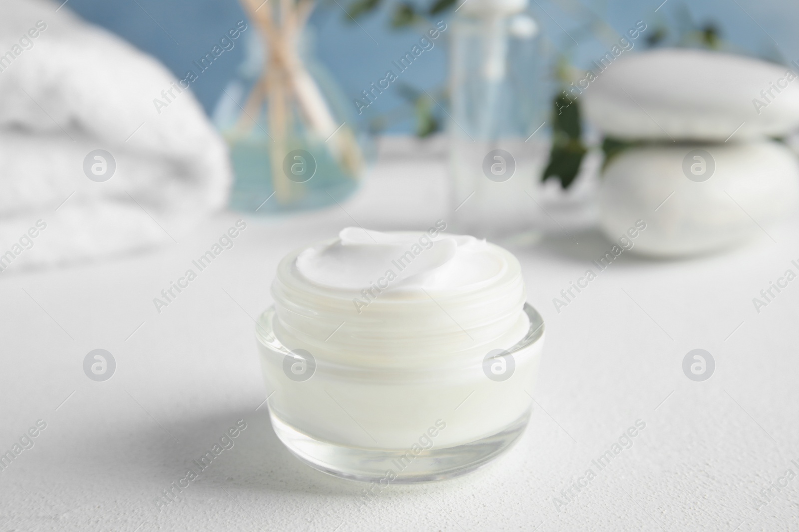 Photo of Jar of body care product on table