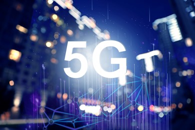 Image of 5G wireless network. Blurred view of night cityscape with bokeh effect