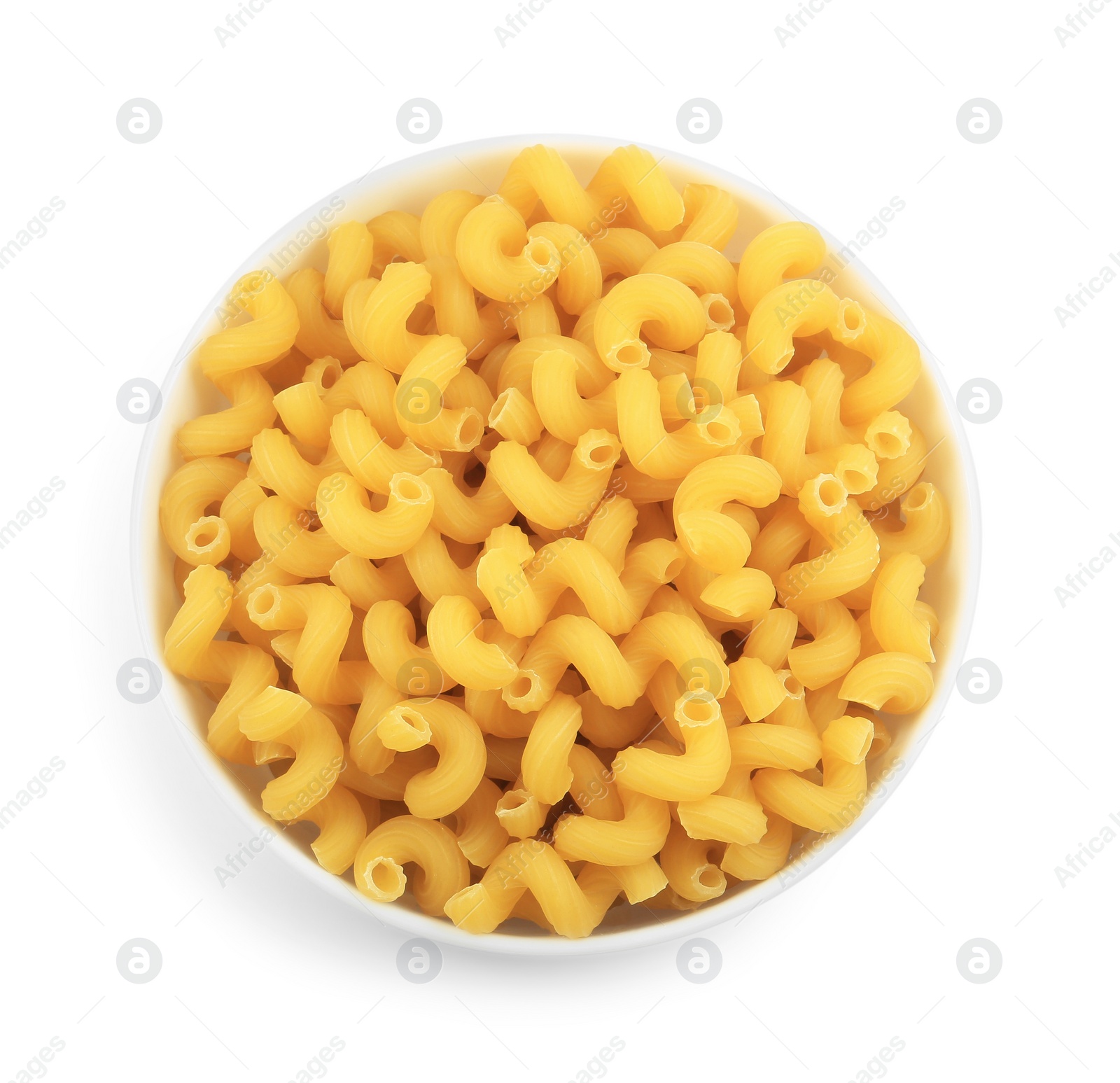 Photo of Raw cavatappi pasta in bowl isolated on white, top view