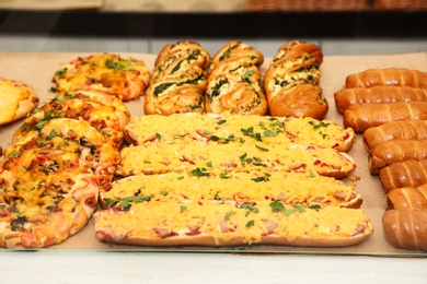 Showcase with fresh pastries in bakery shop