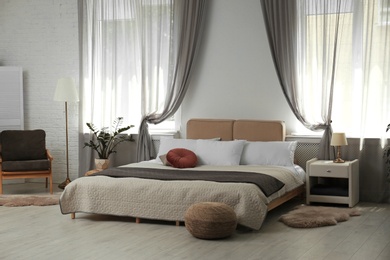 Stylish modern bedroom with decorative elements. Idea for interior design