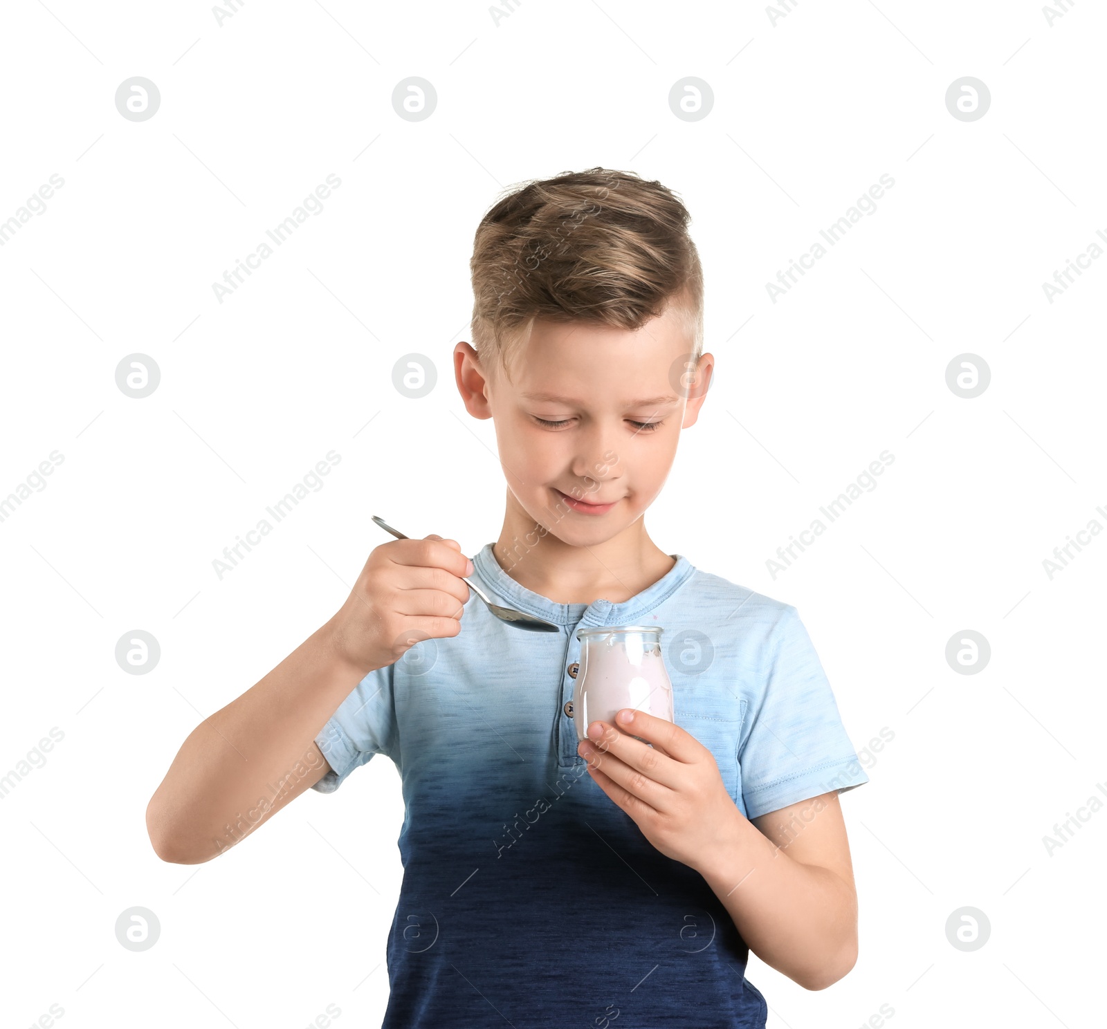 Photo of Little boy with yogurt on white background