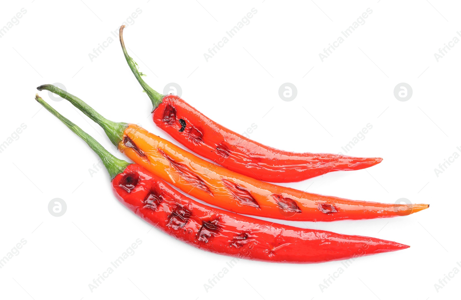 Photo of Tasty grilled chili peppers isolated on white, top view