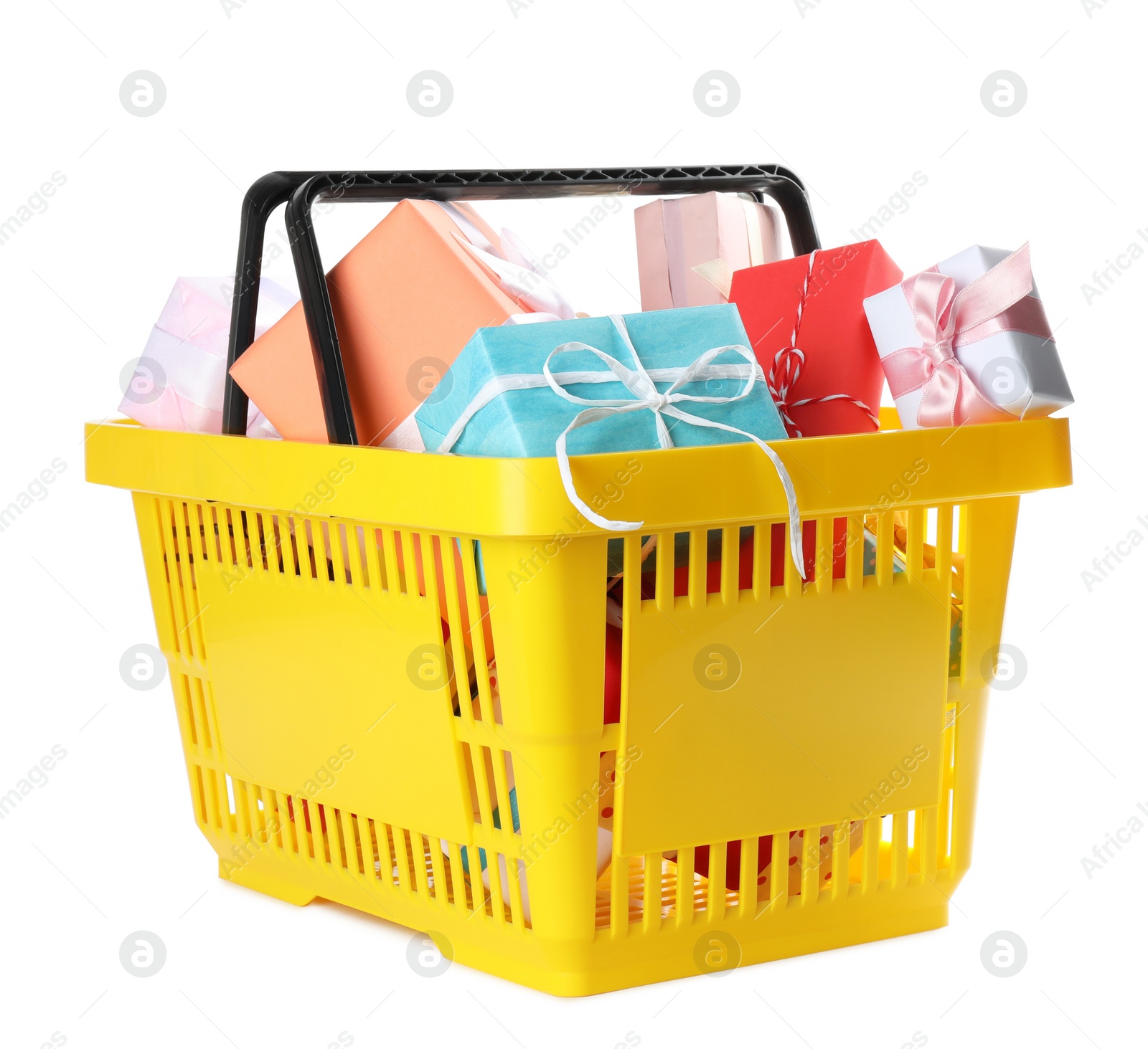 Photo of Shopping basket full of gift boxes on white background