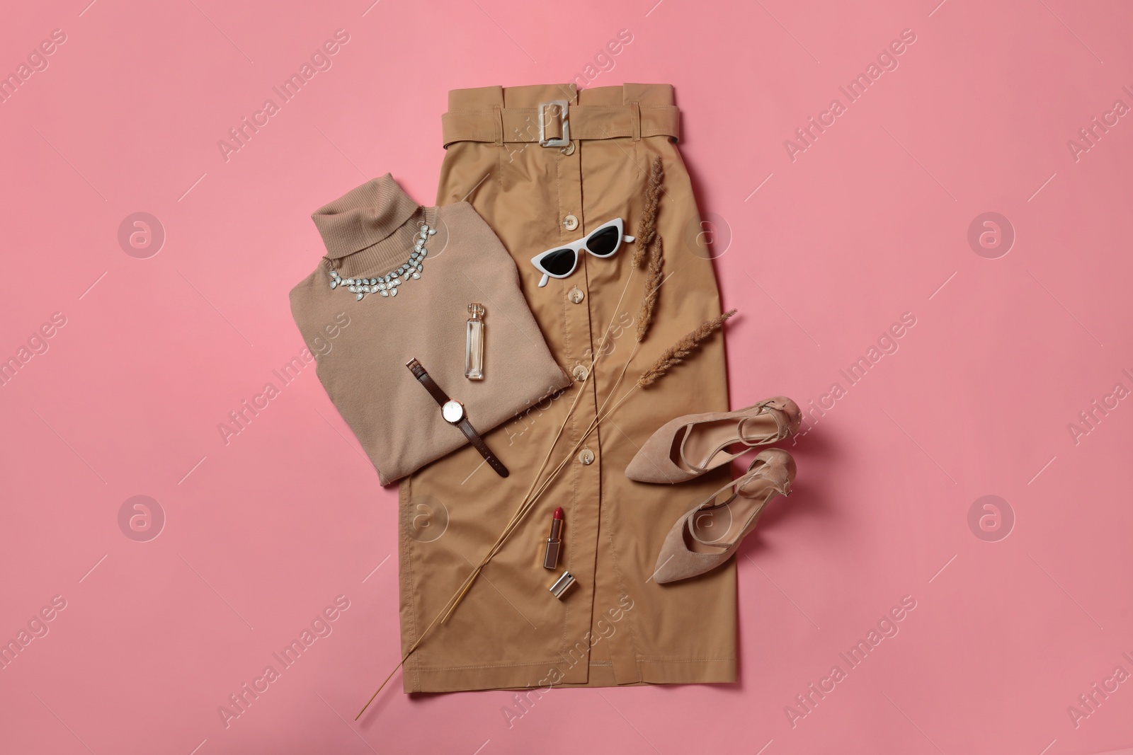 Photo of Stylish shoes, new clothes and accessories on pink background, flat lay