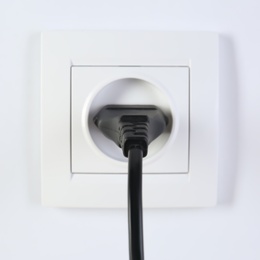 Photo of Power socket and plug on white background. Electrician's equipment