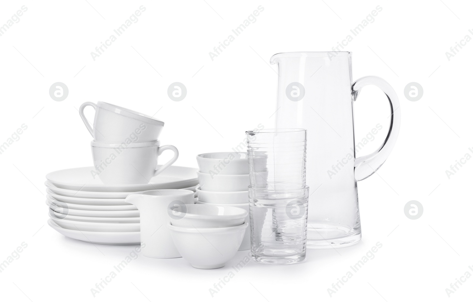 Photo of Set of clean tableware on white background. Washing dishes