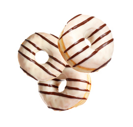 Image of Set of falling delicious donuts on white background