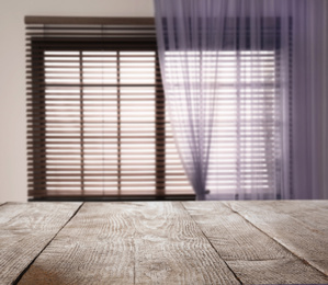 Empty wooden table in room. Space for design