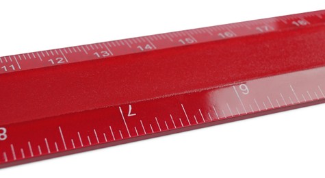 Photo of Ruler with measuring length markings in centimeters isolated on white