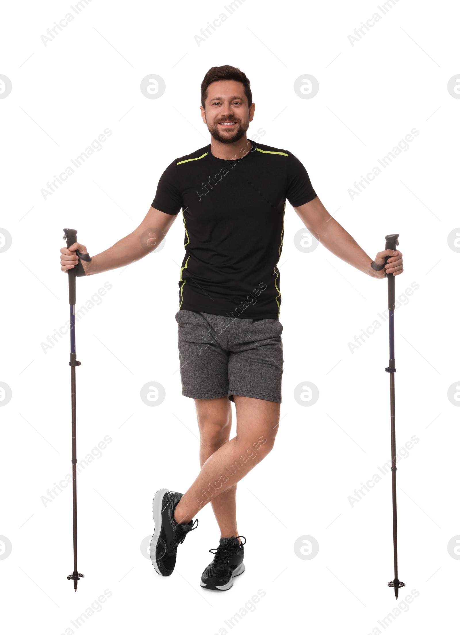 Photo of Man with poles for Nordic walking isolated on white
