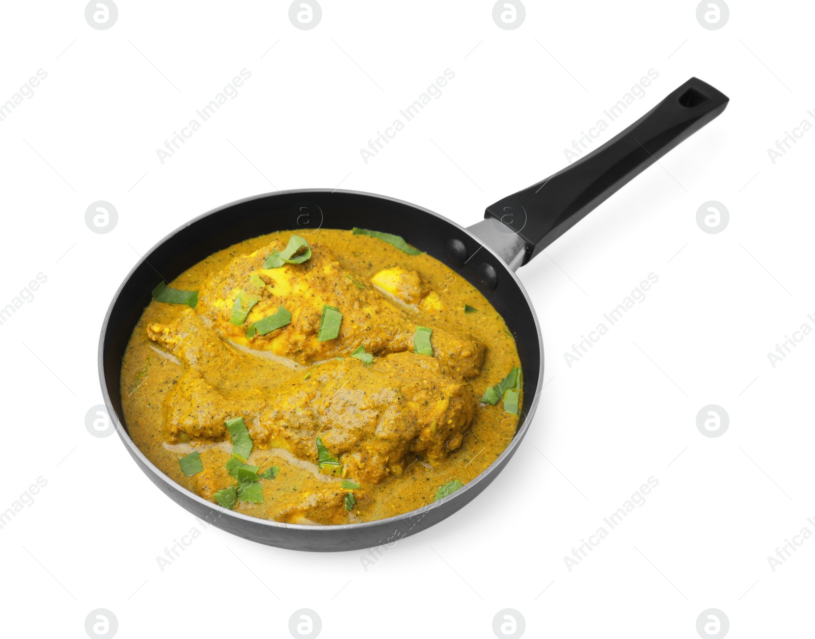 Photo of Delicious chicken with curry sauce and basil isolated on white