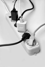 Photo of Extension cord on white background. Electrician's professional equipment