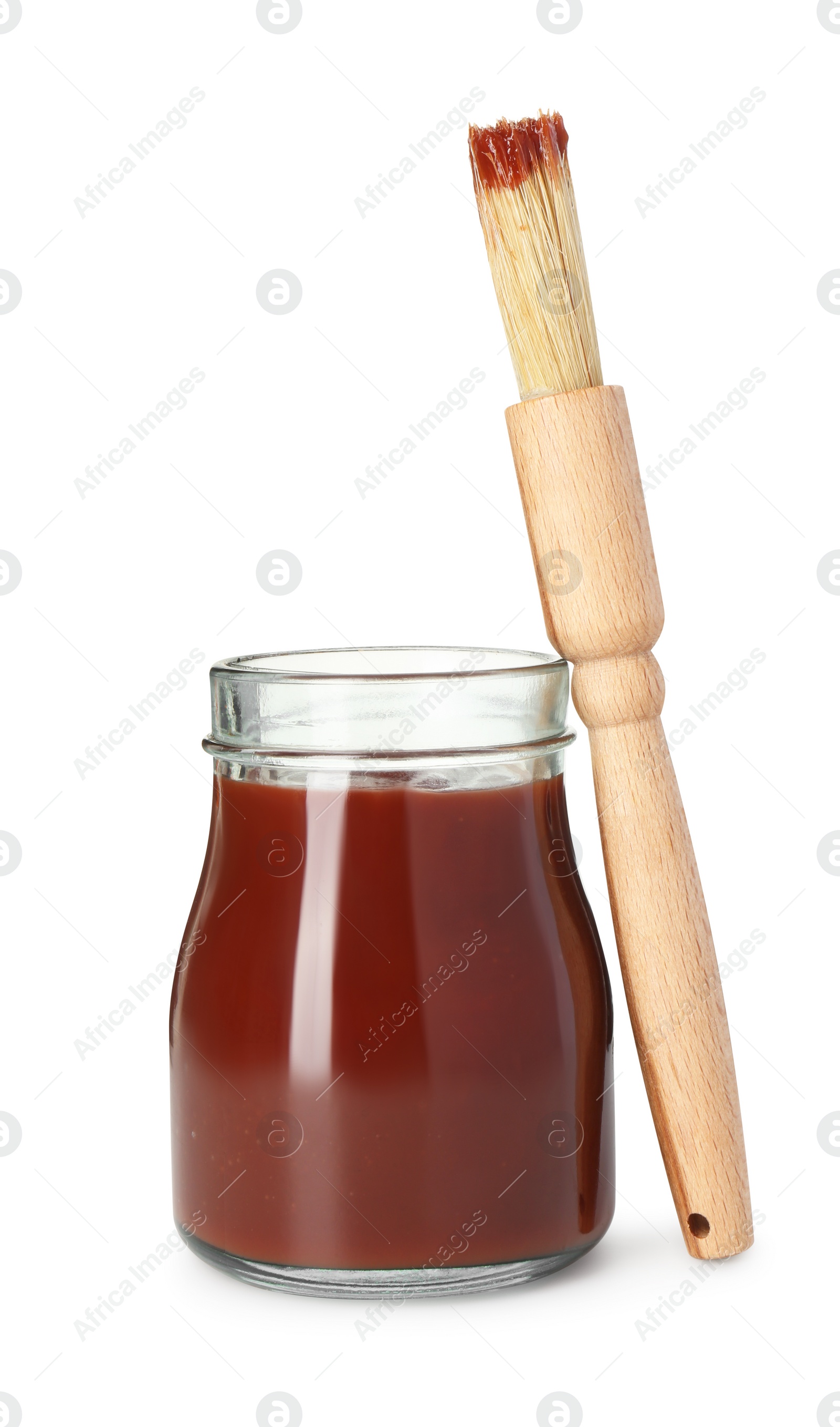 Photo of Brush with tasty barbecue sauce isolated on white